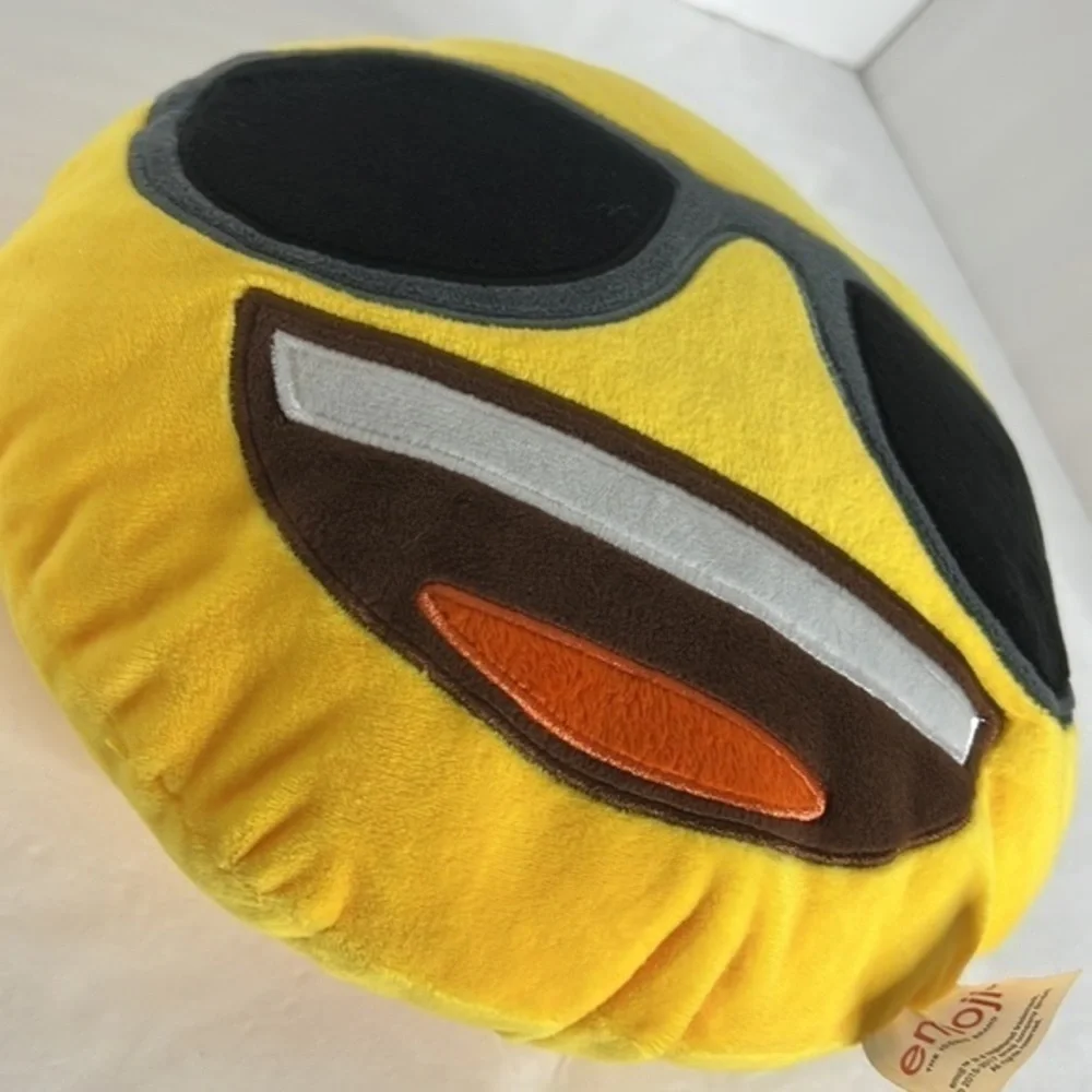 THE ICONIC BRAND EMOJI SMILE PILLOW WITH SUNGLASSES